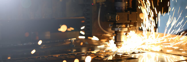 Sparks fly out machine head for metal processing